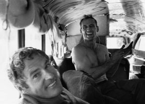 1964, Millbrook, New York, USA --- Psychologist Timothy Leary and Neal Cassady in Bus --- Image by © Allen Ginsberg/CORBIS